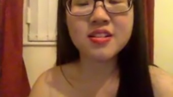 Cute Asian Girl In Glasses.
