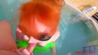 Red Sucks And Wanks A Hard Cock Outside In The Pool