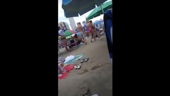 Young Skinny Girl With Thong On The Beach!
