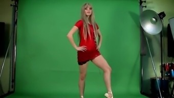 Red Dressed Gymnast Doing Spreads