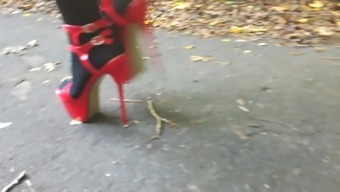 Lady L Walking With Sexy Red High Heels.