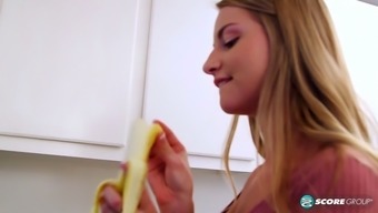 Pink Top Blue Eyed Blond Loves Teasing With Her Banana
