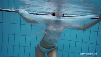 Flat Chested Chick Marusia Exposes Her Pubic Hair While Swimming In The Pool