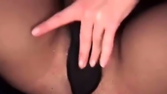 Woman Masturbates And Ejaculates Through Pantyhose