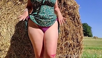 Curvy Woman Undressing In The Countryside