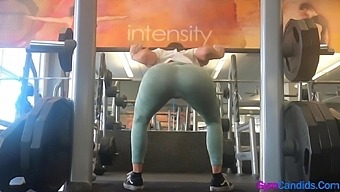 Gym Hot Babe In Tight Green Leggings