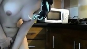 Cute Asian Chick Attempts To Handle Ohmibod In Kitchen