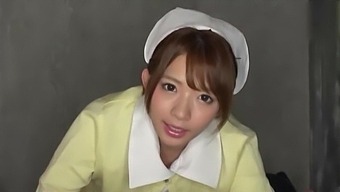 Pretty Japanese Nurse Mari Rika Drops On Her Knees To Give Head