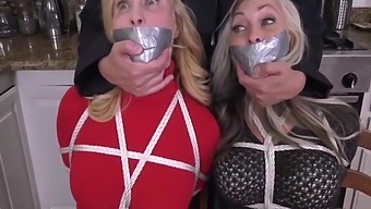 Two Milfs Duct Tape Gagged In Boots Bondage