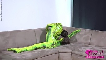 Spineless Lady In Shiny Green Catsuit - Watch4fetish