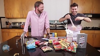 Hd Video Of Two Men Cooking And Dining In The Kitchen