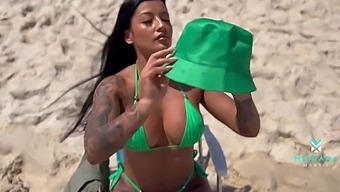 A Brawny Brazilian Whore Gets Uniformly Covered After Getting An Even Tan On The Beach.