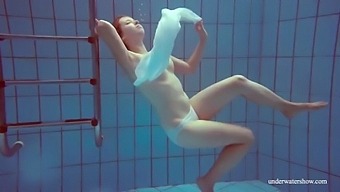 Hot Lass Melisa Darkova Is Attired In Water.