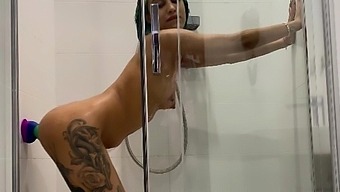 Small Tits Tattooed Girl Enjoys A Solo Shower Session With A Toy
